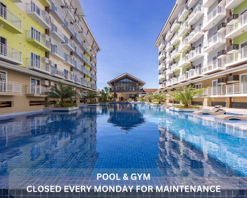 617A Condotel Near Airport &Mall with Pool,Gym,Netflix