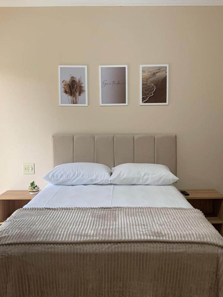 Suíte de Casal Privativa com Sacada